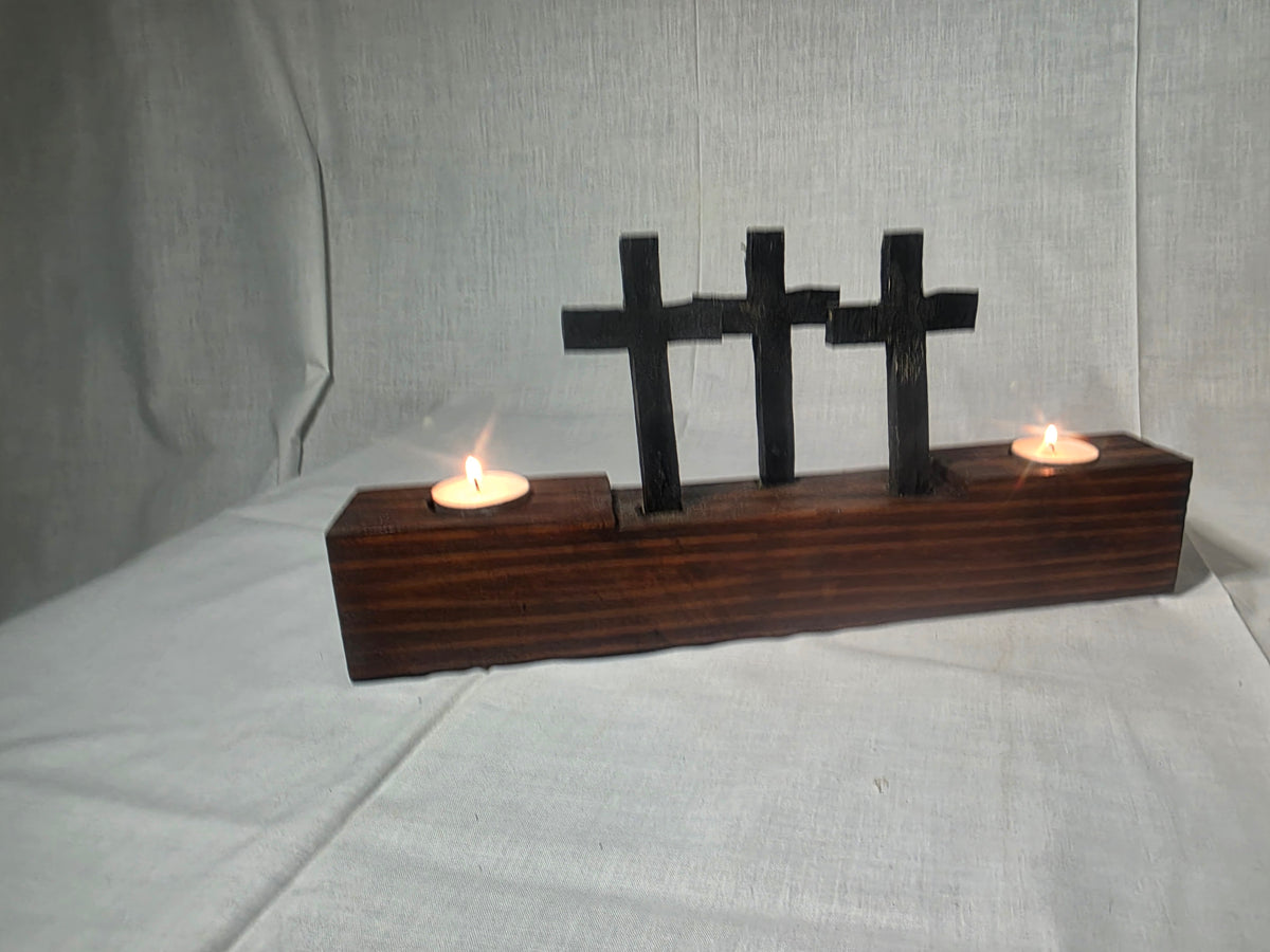Candle holder with 3 crosses
