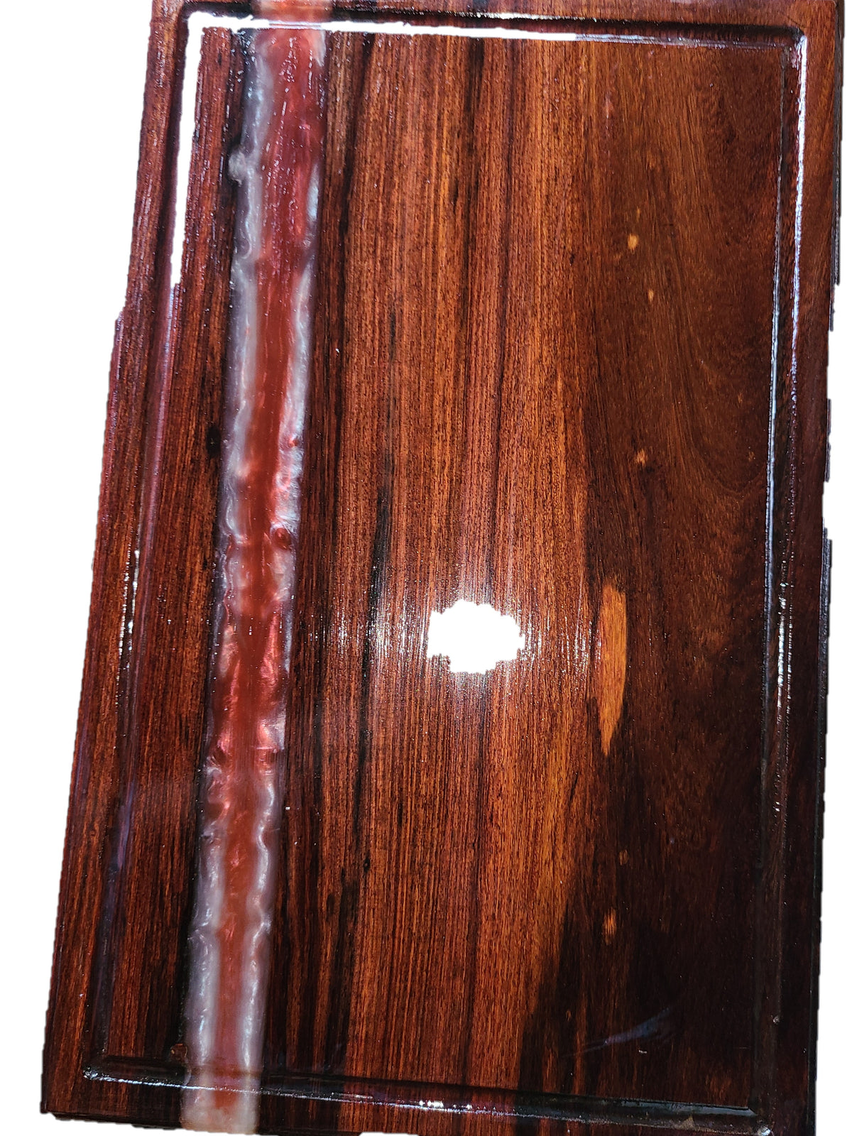 Solid oak cutting board with red and white river