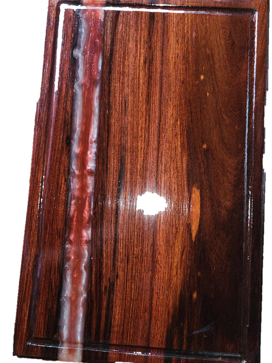 Solid oak cutting board with red and white river